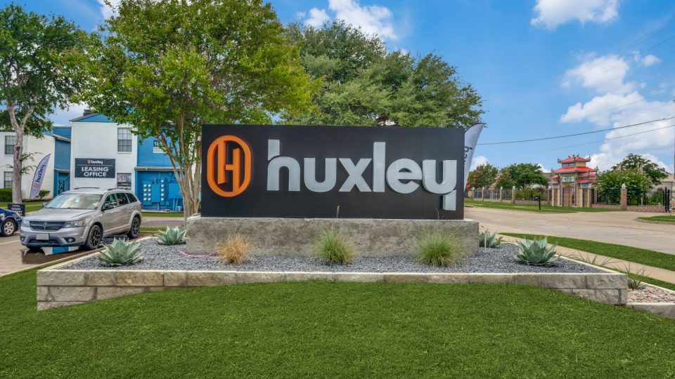 huxley sign in front of a building at The The Huxley